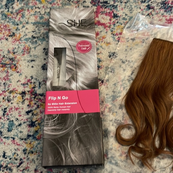 Halo hair extension-red hair. With hanger and storage bag, extra cord, and comb. - Picture 5 of 10